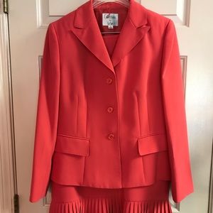 Collections for Le Suit. Color is coral orange, size 12, like new lined suit.